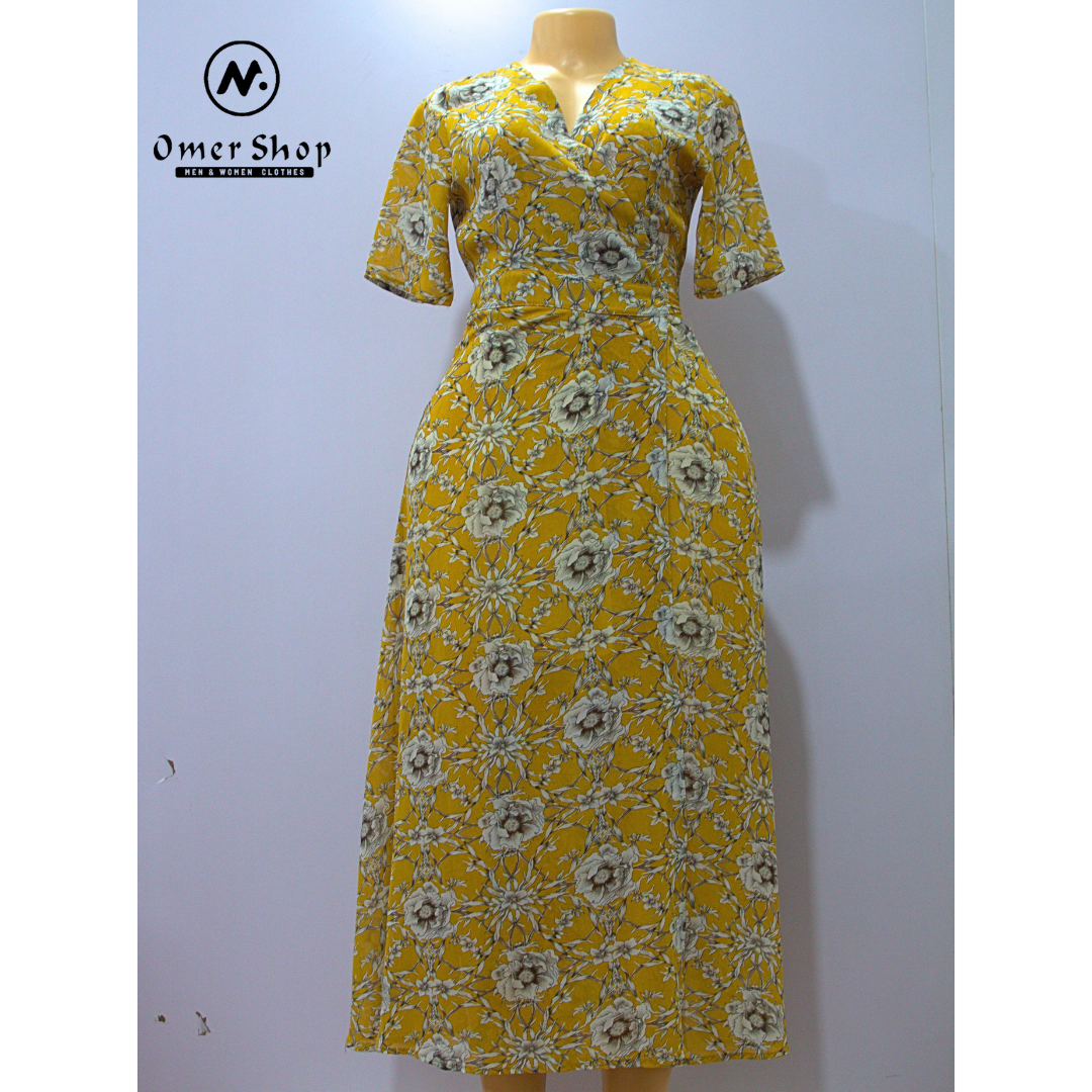 a yellow short sleev dress