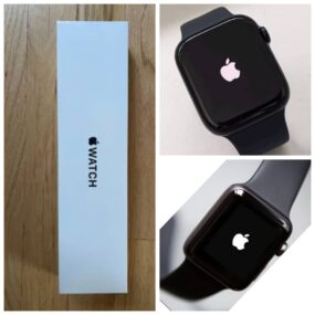 Apple Watch, specifically featuring the packaging and the device itself with the Apple logo displayed on the screen